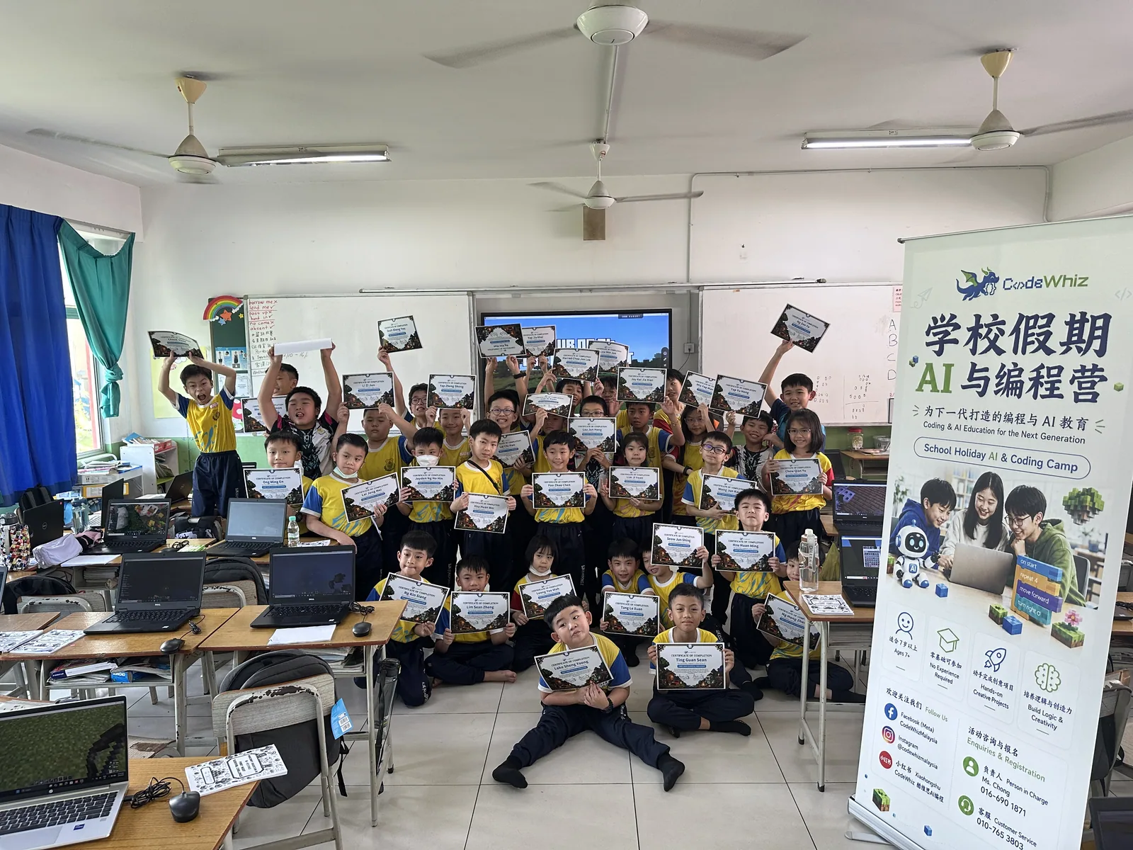 Children celebrating the completion of the CodeWhiz holiday programme at SJK(C) Kepong 2